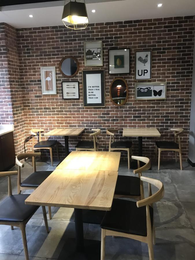 Manxin Hotel Shanghai Xujiahui Bagian luar foto