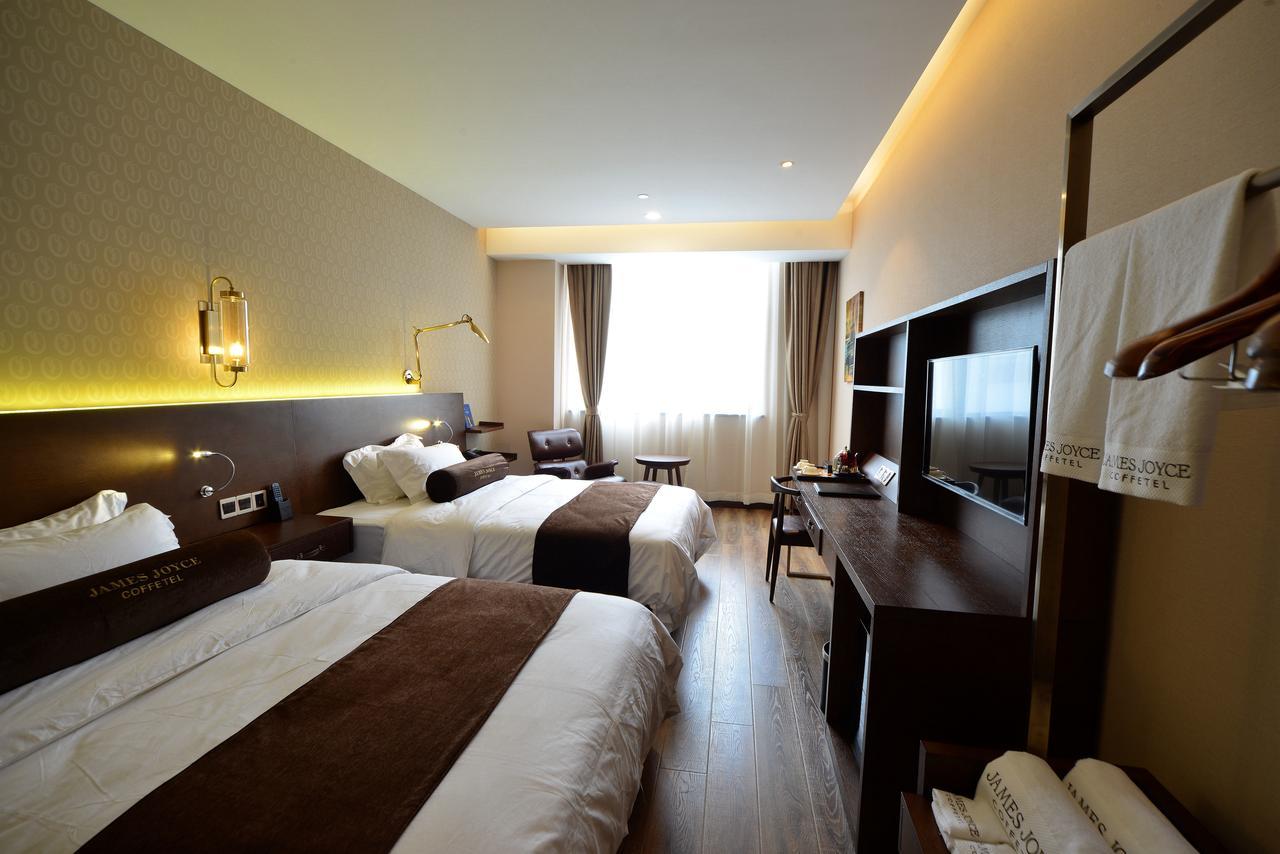 Manxin Hotel Shanghai Xujiahui Bagian luar foto